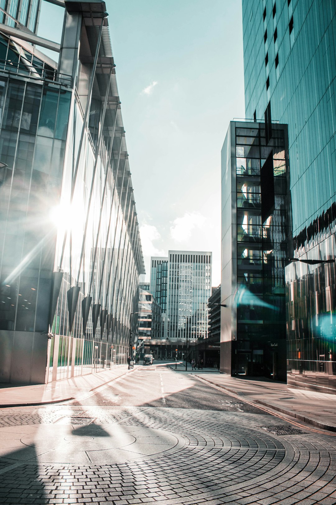 Sun glinting off Tall London Buildings